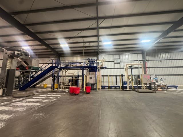 Propak CW12 turnkey packing line with JN baggers and Symach MACH 5